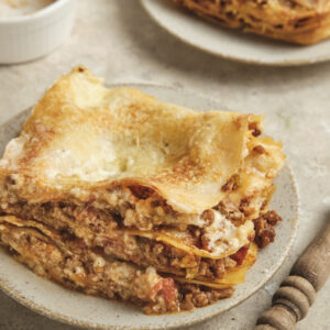 Italian Beef Lasagna cut into portion a plated on a plate